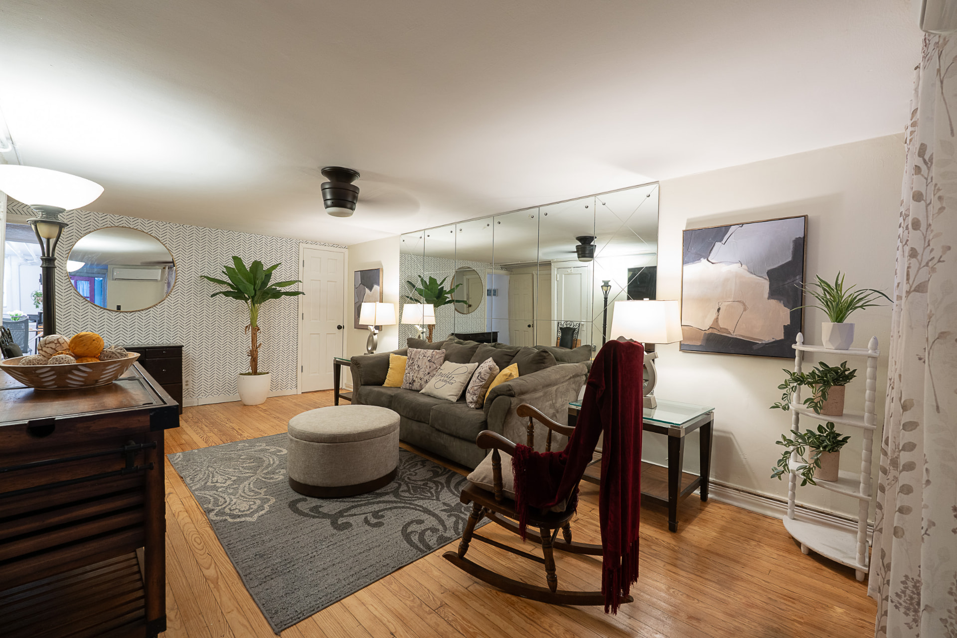 Living room at Shauna's Chateau with comfortable seating and warm lamp light